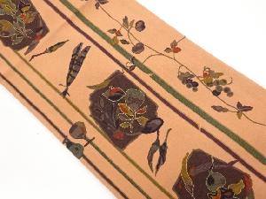 縮緬地金彩抽象魚に野菜・果物模様名古屋帯